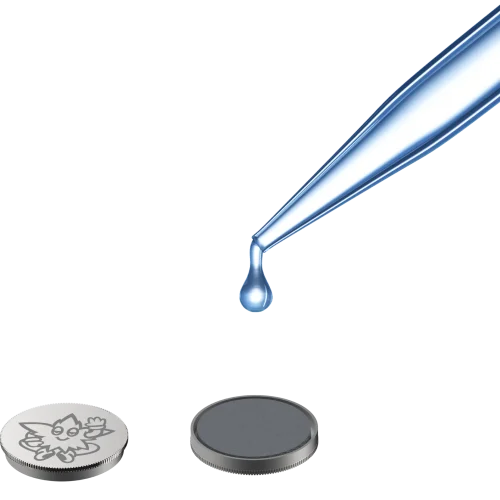 a pipette dropping one drop of distilled water onto the Nugidor proprietary moisture disc